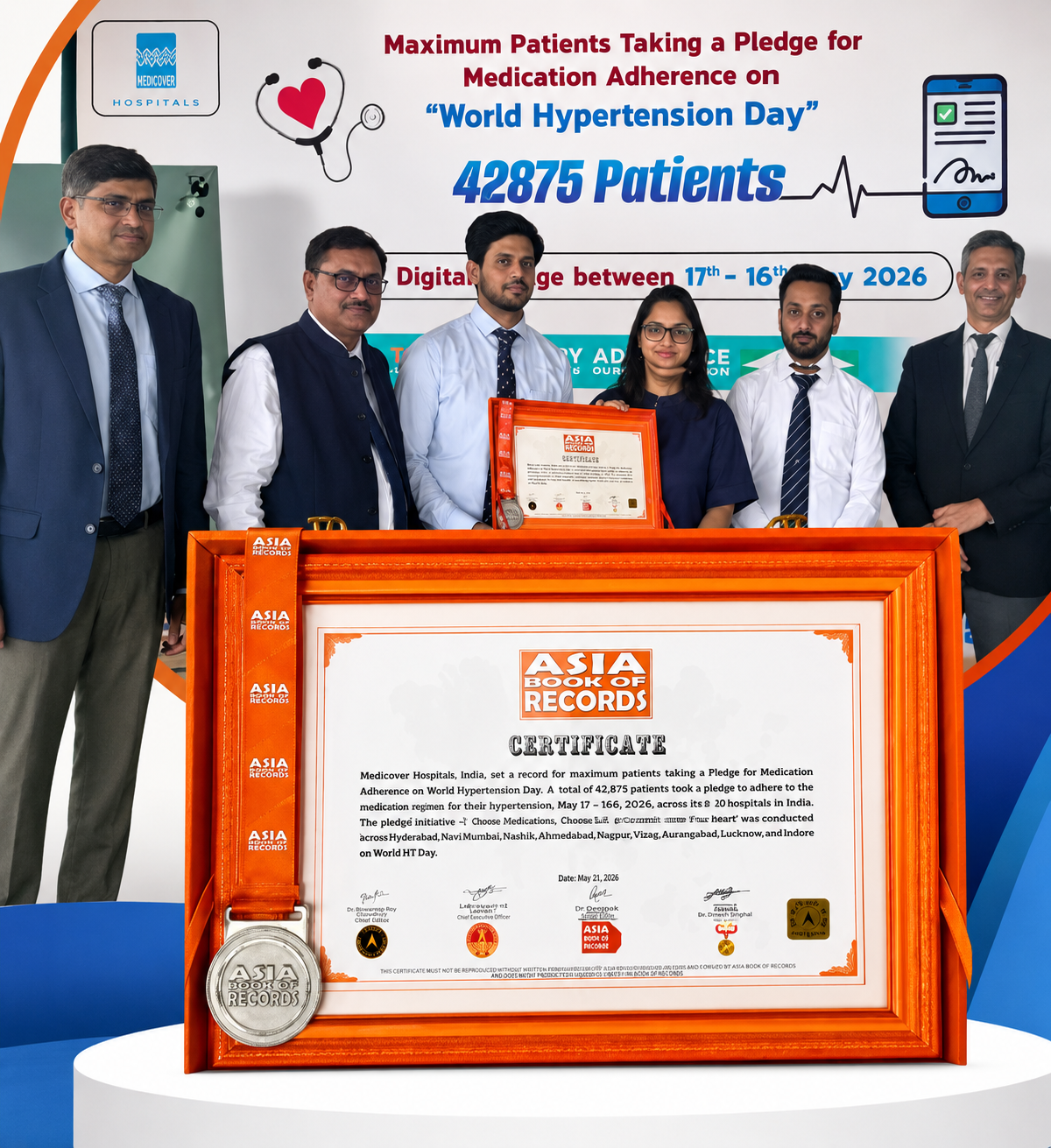 The Micro Labs team receiving the Asia Book of Records certificate for the medication adherence pledge drive